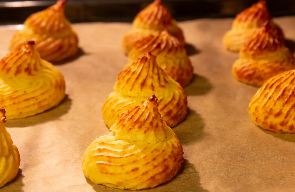Duchessepotatis i ugnen. Snart klara